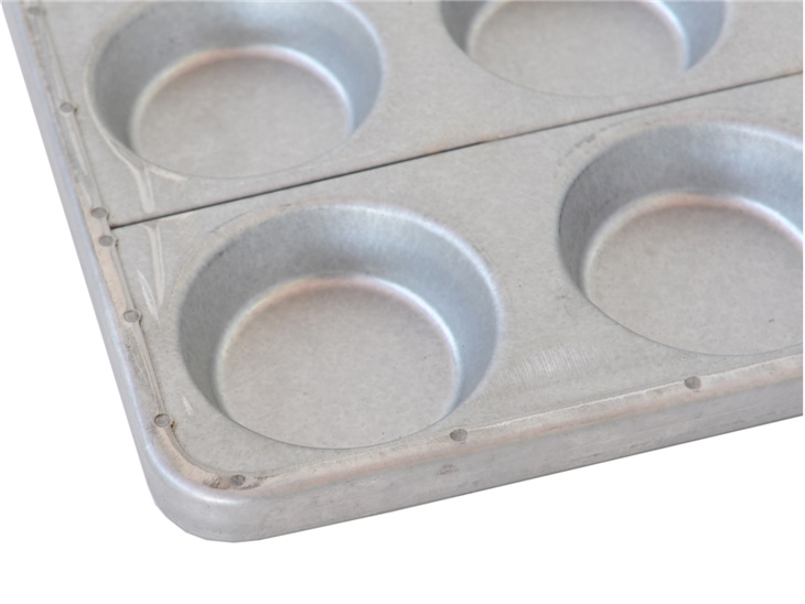 Pan with moulds for tarts